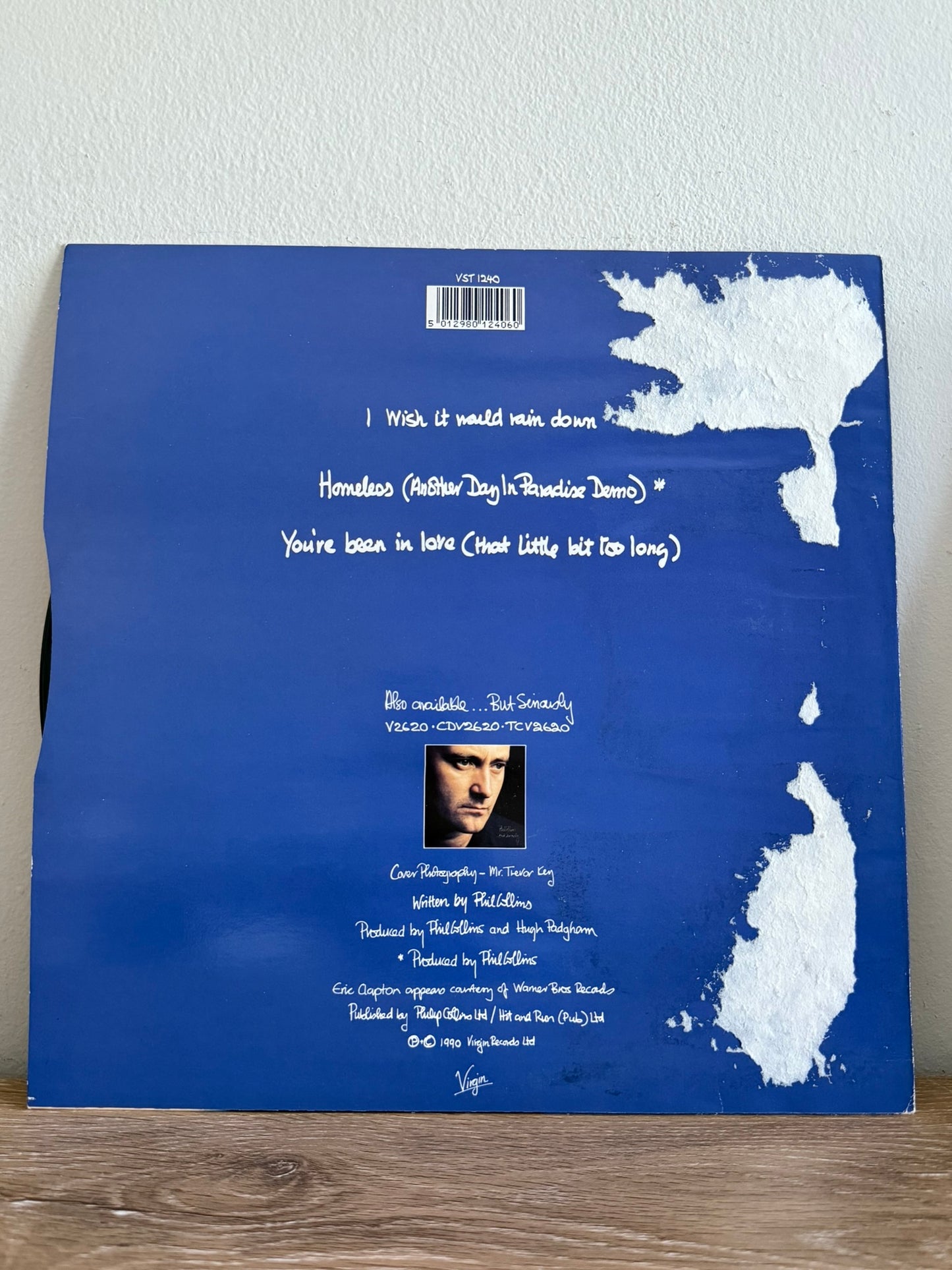 Phil Collins – I Wish It Would Rain Down